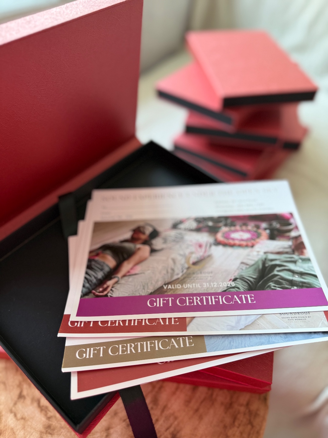 Kate Sound Studio gift certificates presented in a luxury red box